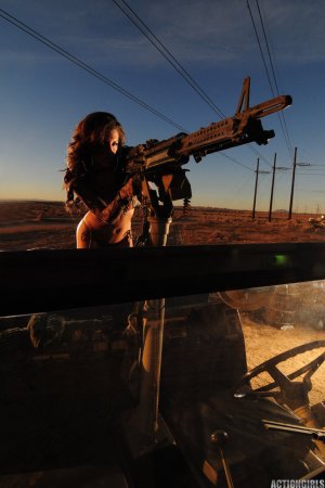 Mya – Posing with toy guns photo 12